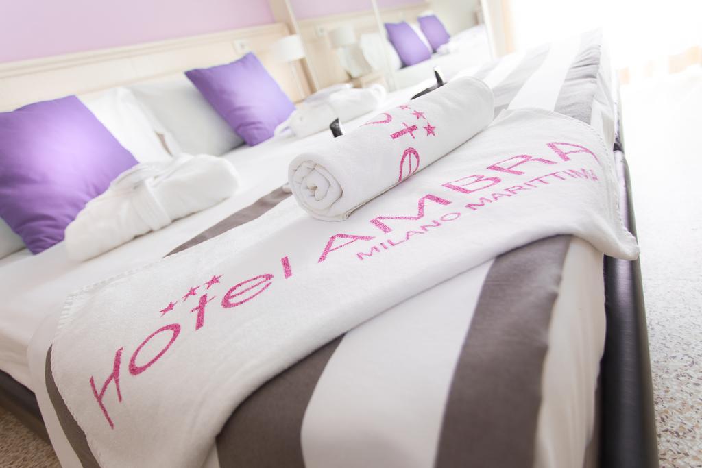 Hotel Ambra Мілано-Маріттіма Номер фото
